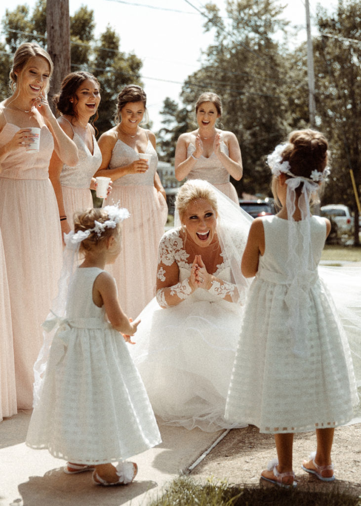 flower girls first look with the bride