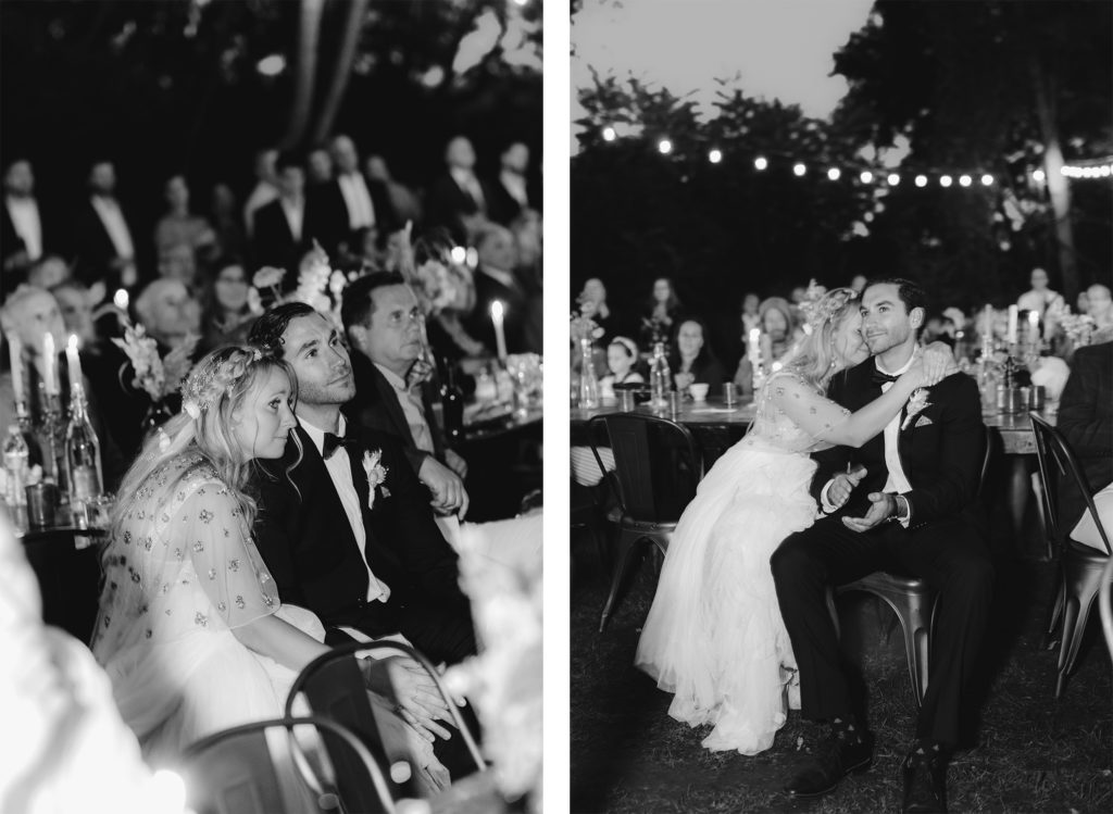 Bride and groom get teary eyed watching their micro wedding video with their guests at their reception.