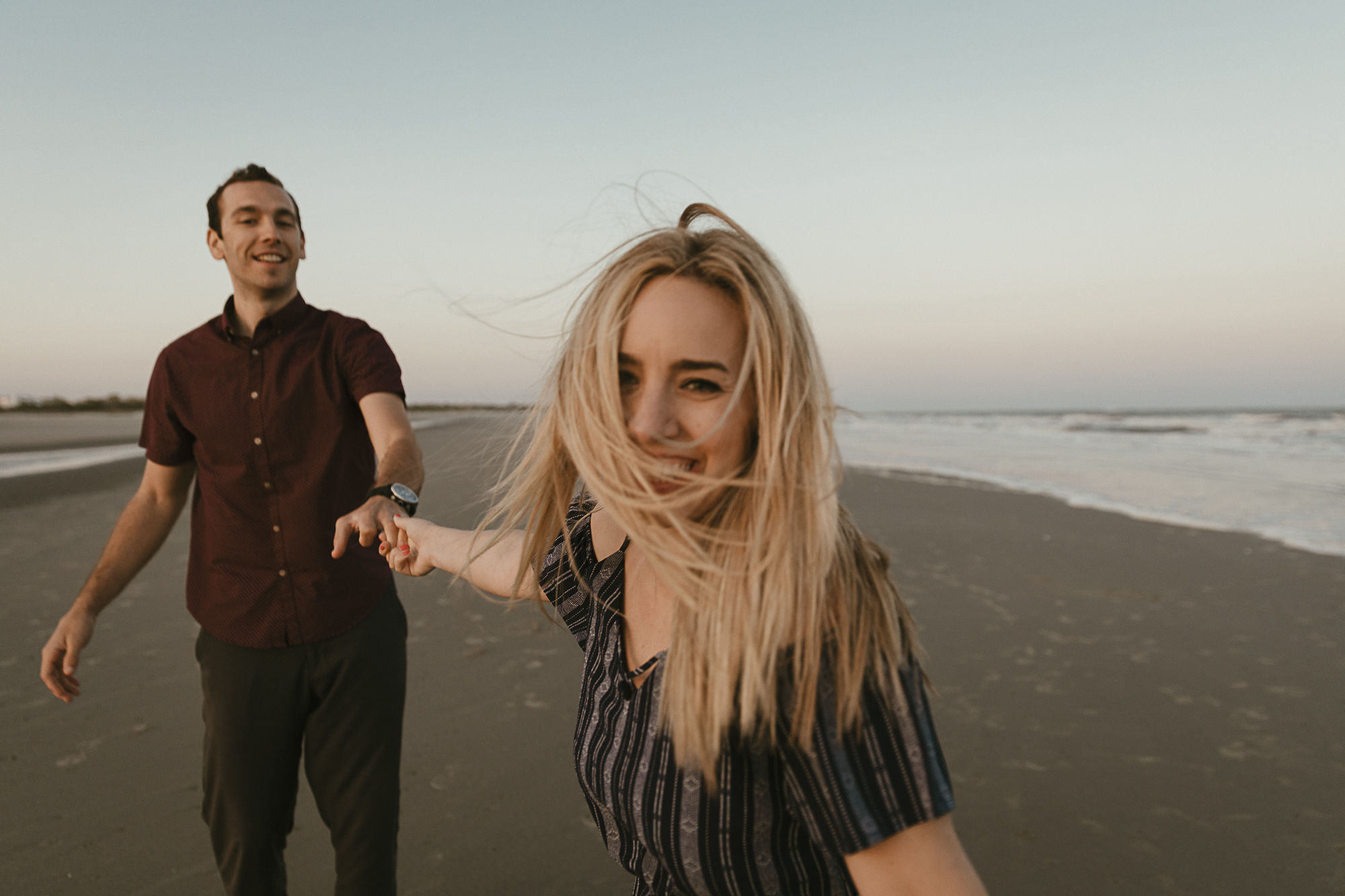 couple on the beach at daniels island