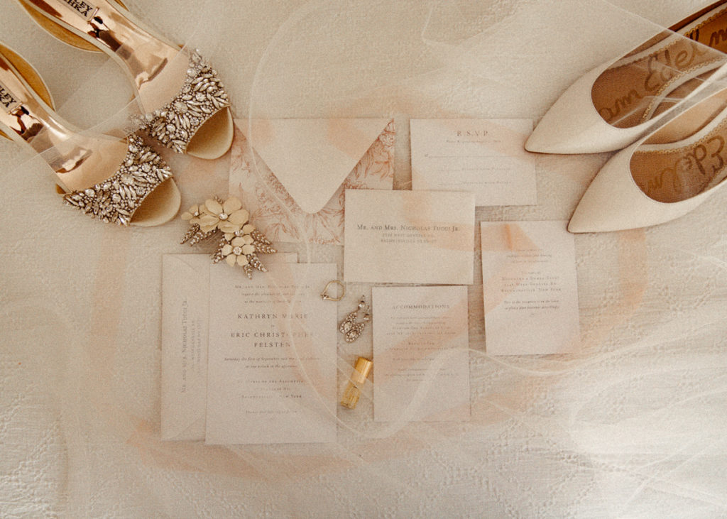 wedding invitation, shows, jewelry, and veil 