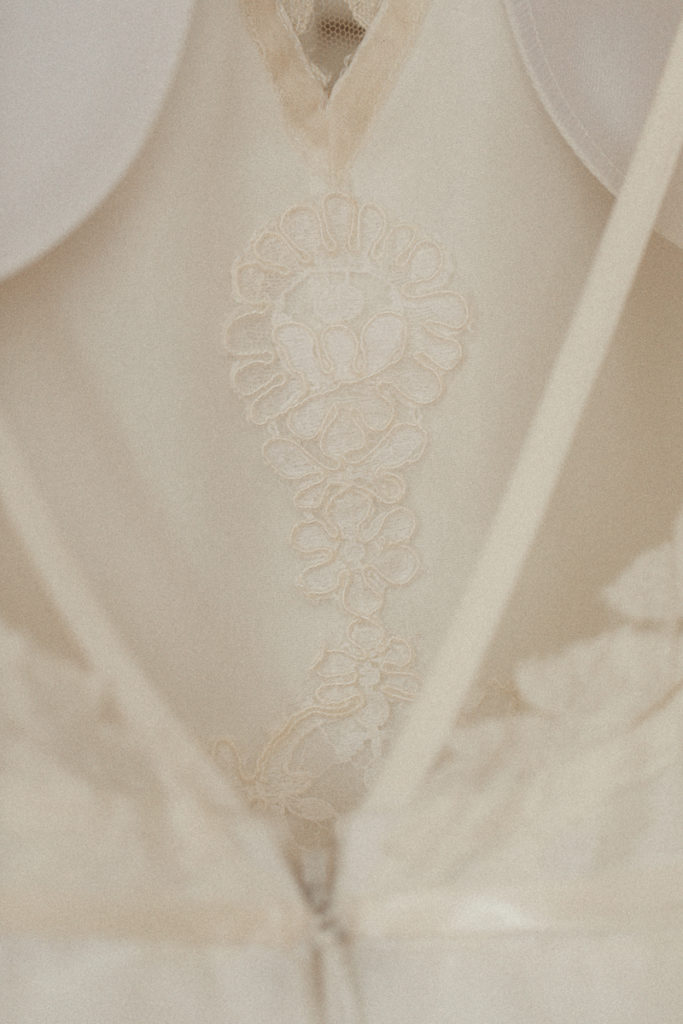 piece of mom's wedding dress sewn into the bride's wedding dress
