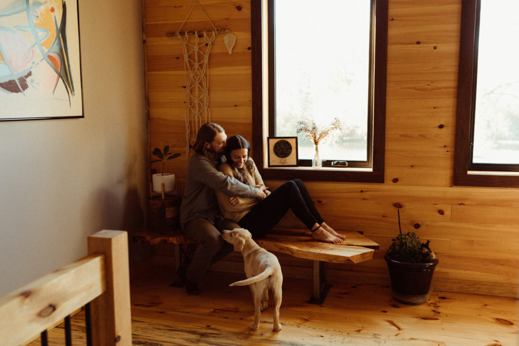 For a cozy in home session, comfortable sweaters and casual attire is a great thing to wear for engagement photos.