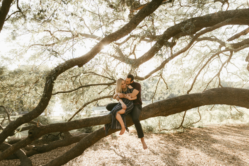 A couple takes their engagement photos at their favorite park for a personalized session.