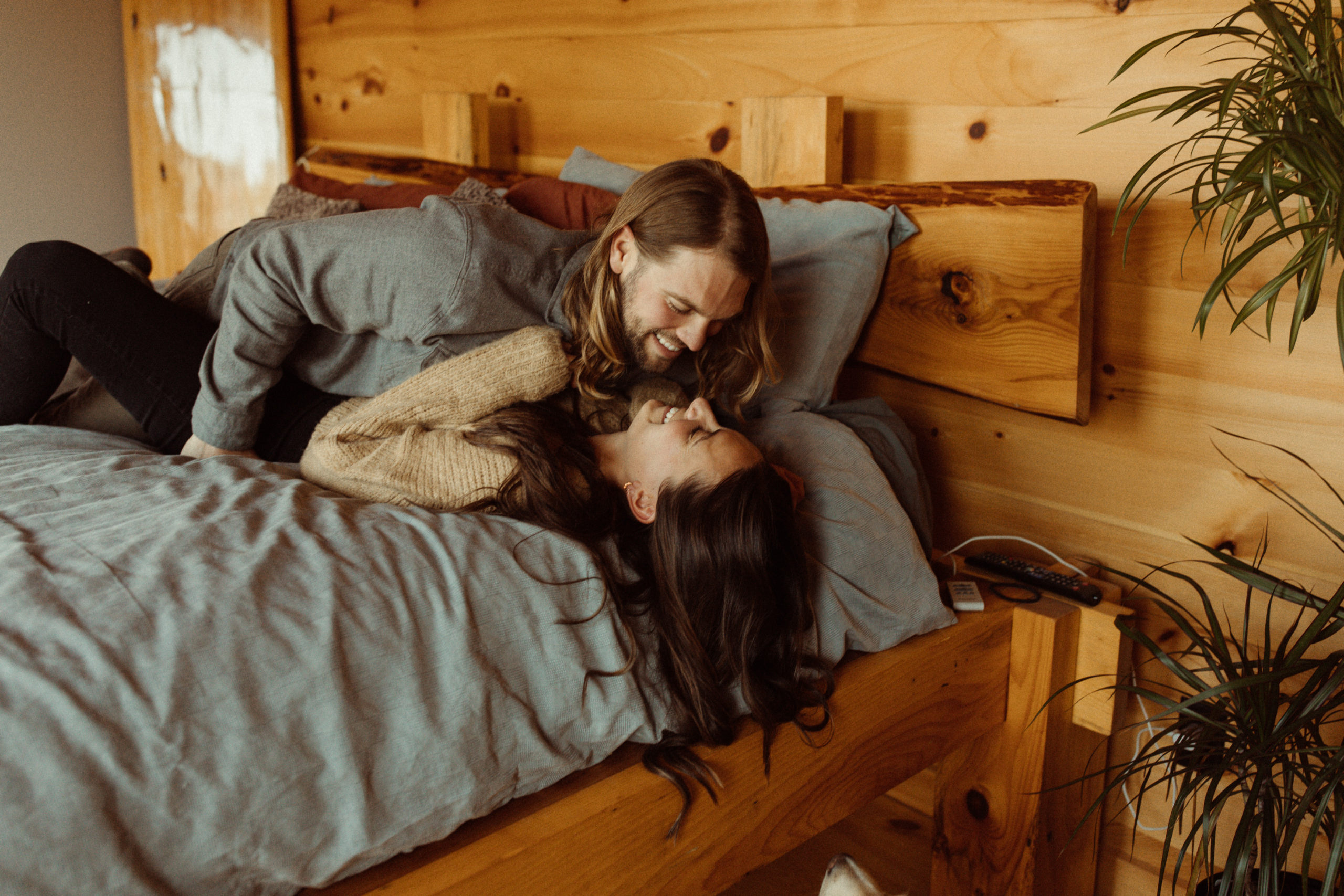 A couple in their home for their unique engagement shoot.