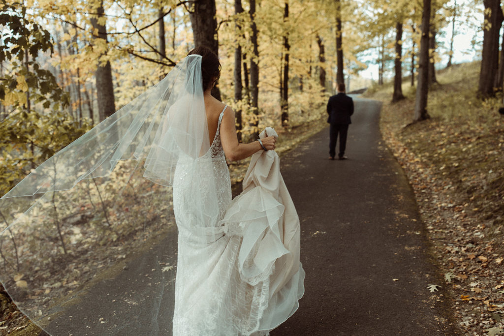 Wedding first look on forest trail